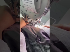 Bilgisayara dayalı dikiş makinesinin kol deliklerine bantlar takmak ve kenarları kesmek gerekir.